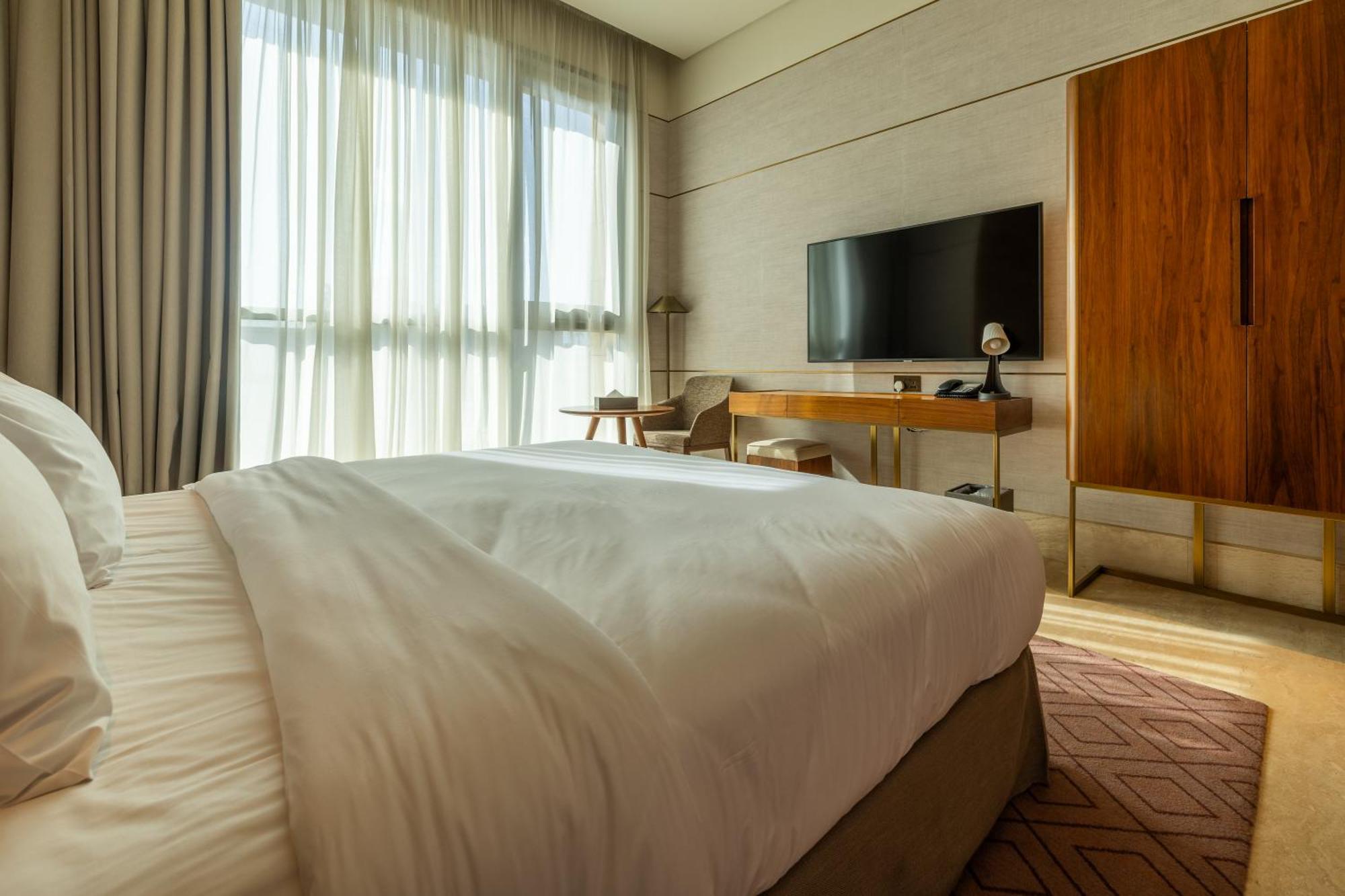 Shirvan Hotel City Yard Dzsidda Kültér fotó A bedroom at the hotel