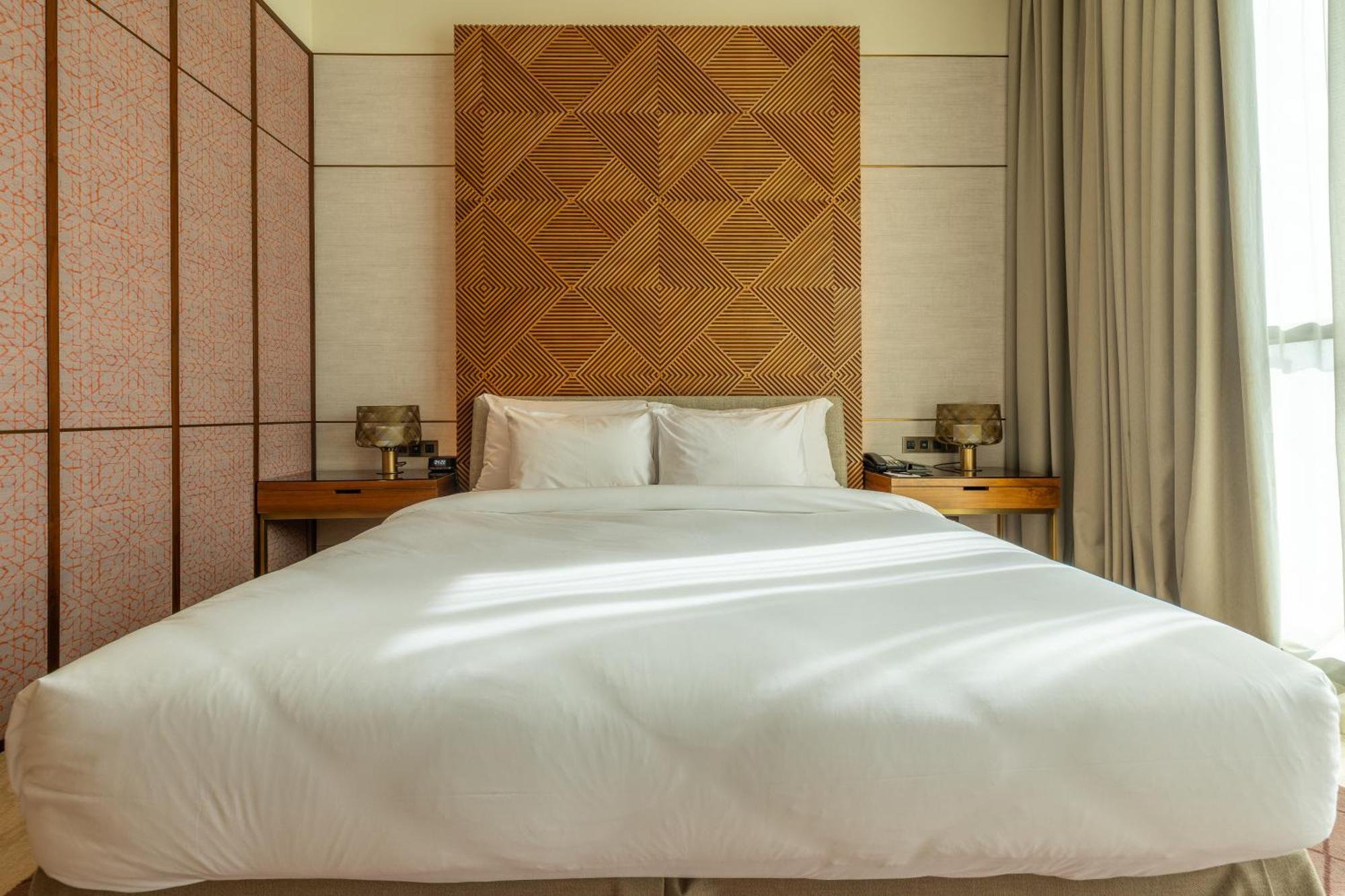 Shirvan Hotel City Yard Dzsidda Kültér fotó A bed